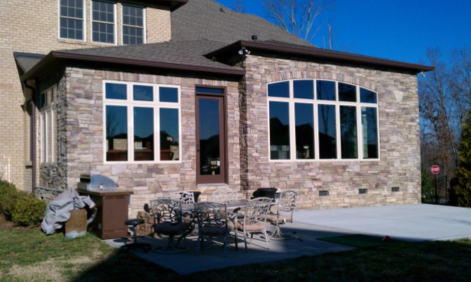 This brick sunroom was designed and built by Archdeck of Charlotte